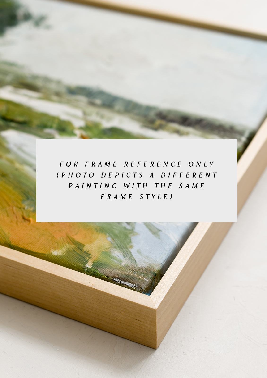 A framed original landscape painting of a meadow.