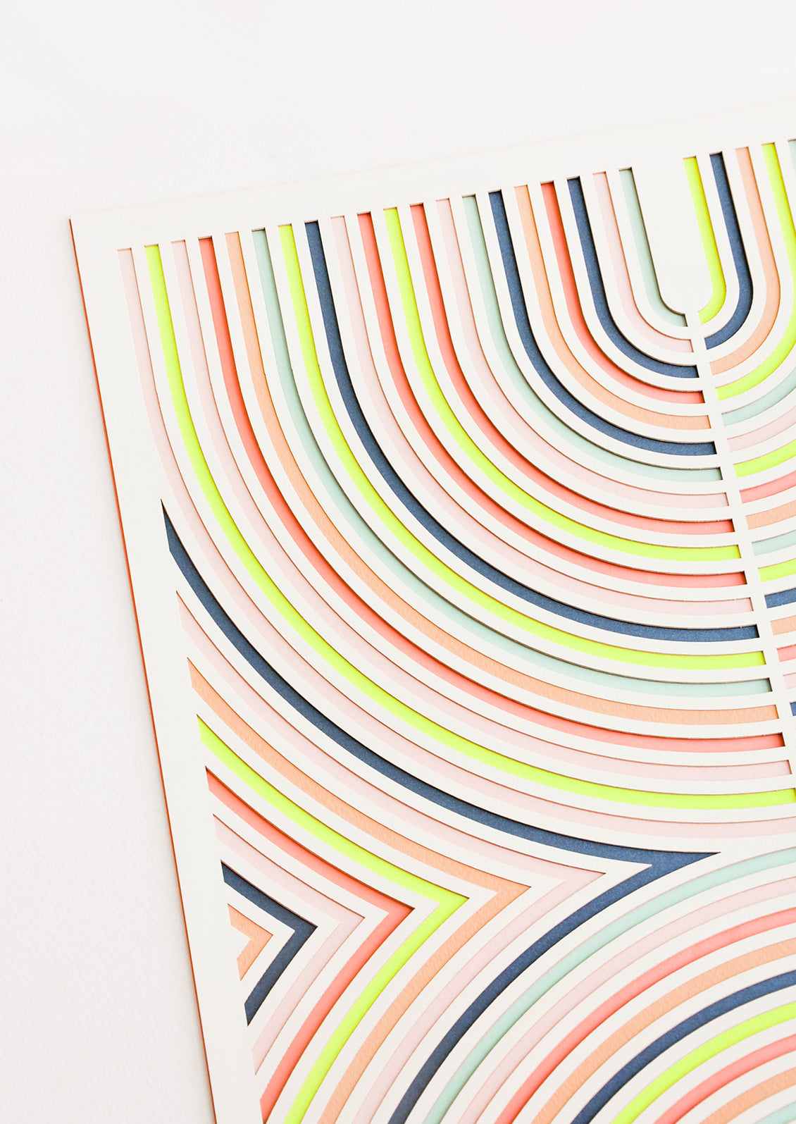 Detail of layered art print with laser-cut design