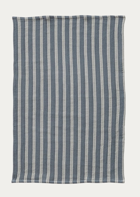 A woven kitchen towel in blue and white stripe.