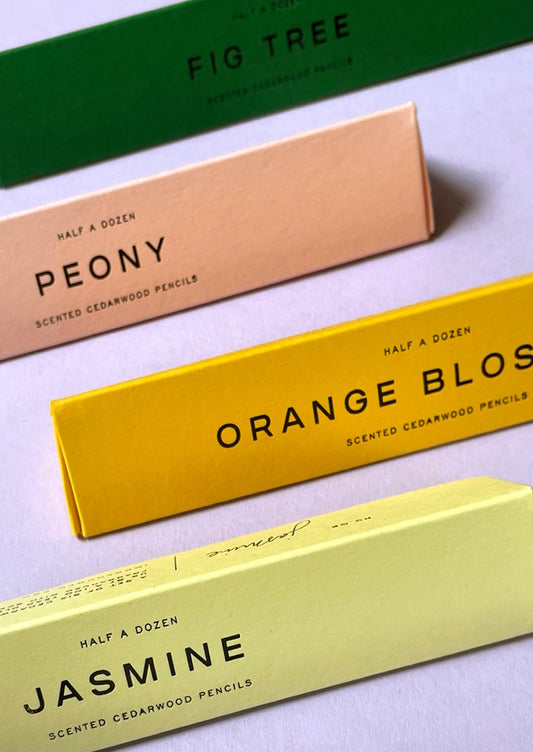 Colored packaging holding scented pencils.