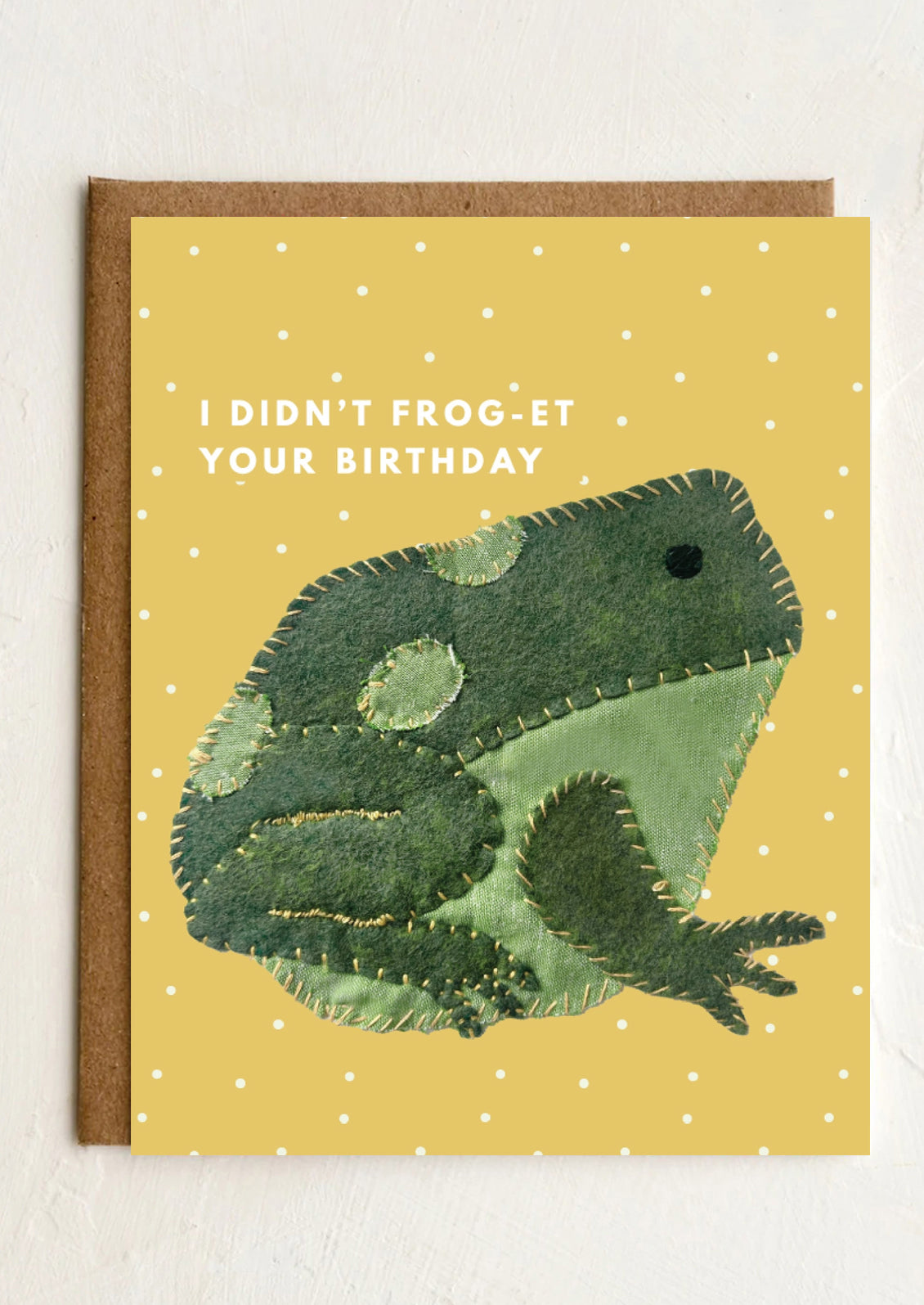 A greeting card with frog on it.