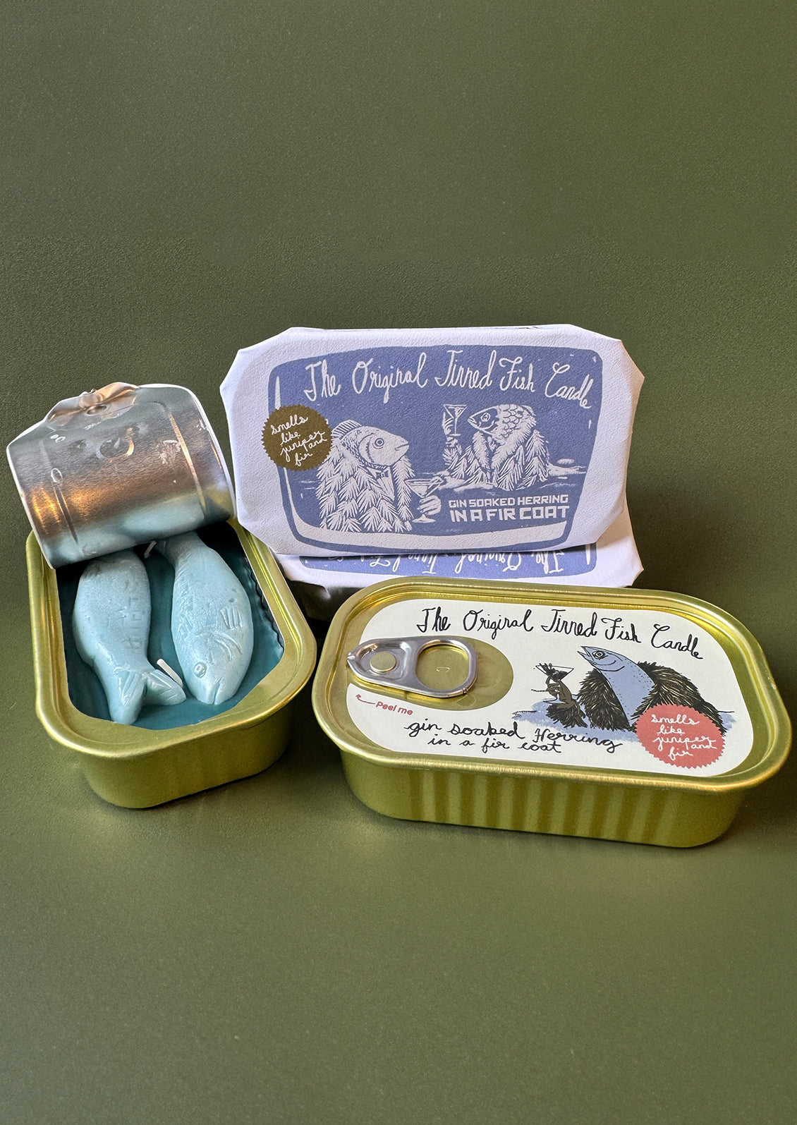 Multicolor tin of sardine candles.