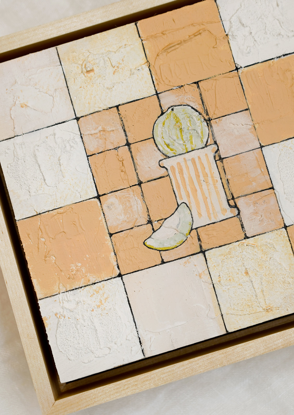 An original painting featuring tile grid and melon on pedestal, in peach palette.