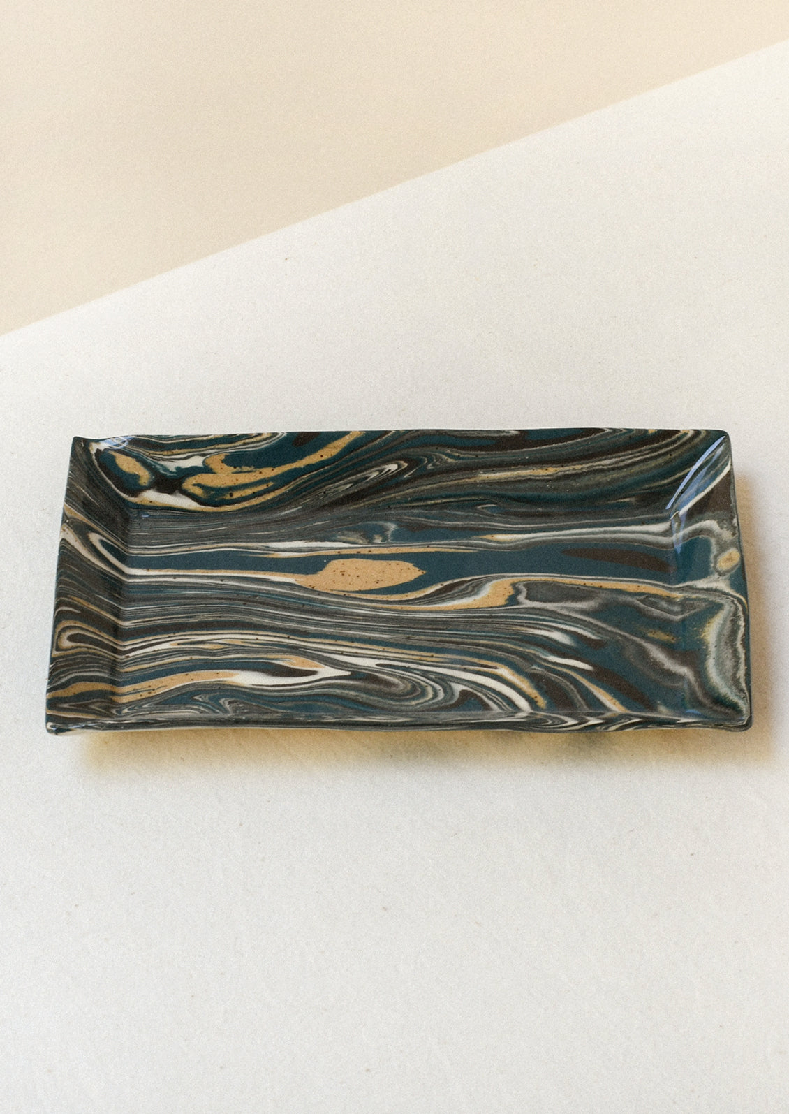 Handmade rectangular catchall tray with a teal blue marble design.