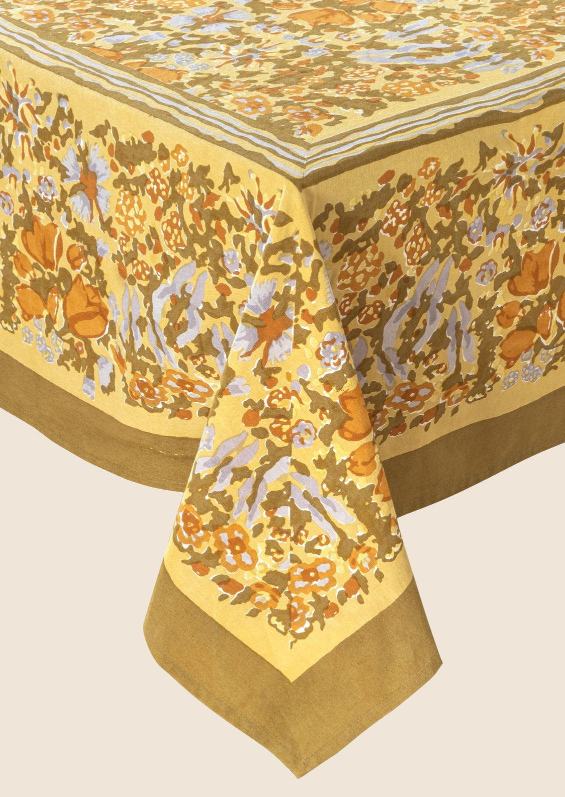 A mustard floral print tablecloth.