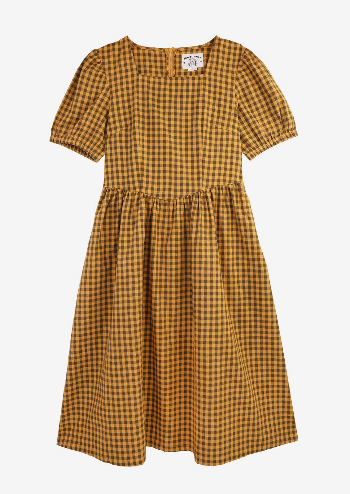 A brown and mustard gingham short sleeve dress.