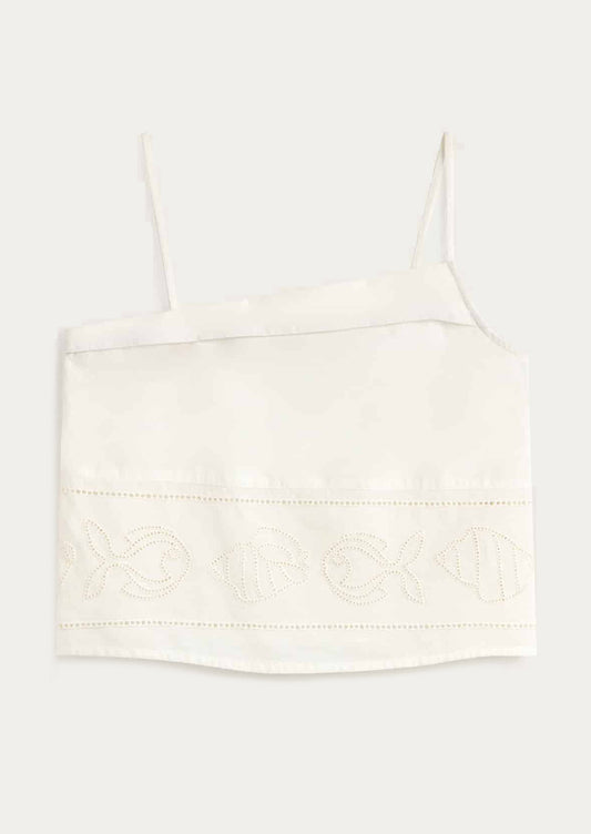 White lace-trimmed top on a light gray background