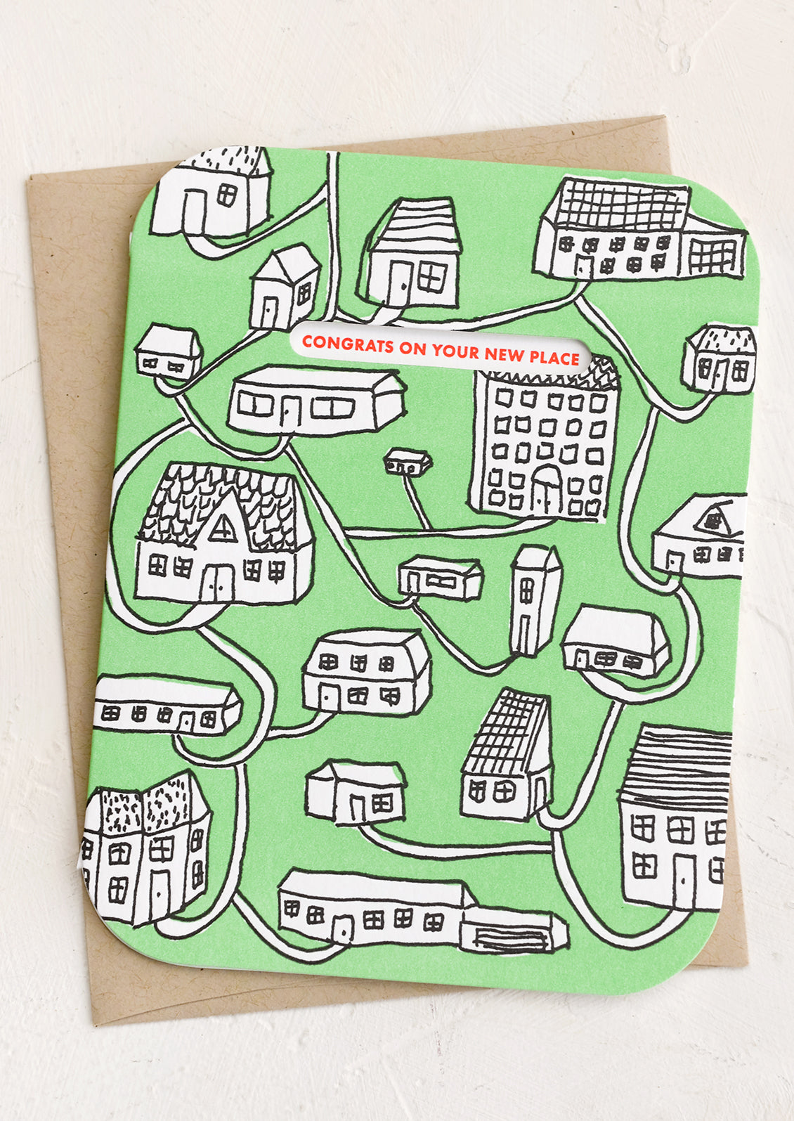 A green card with images of houses.