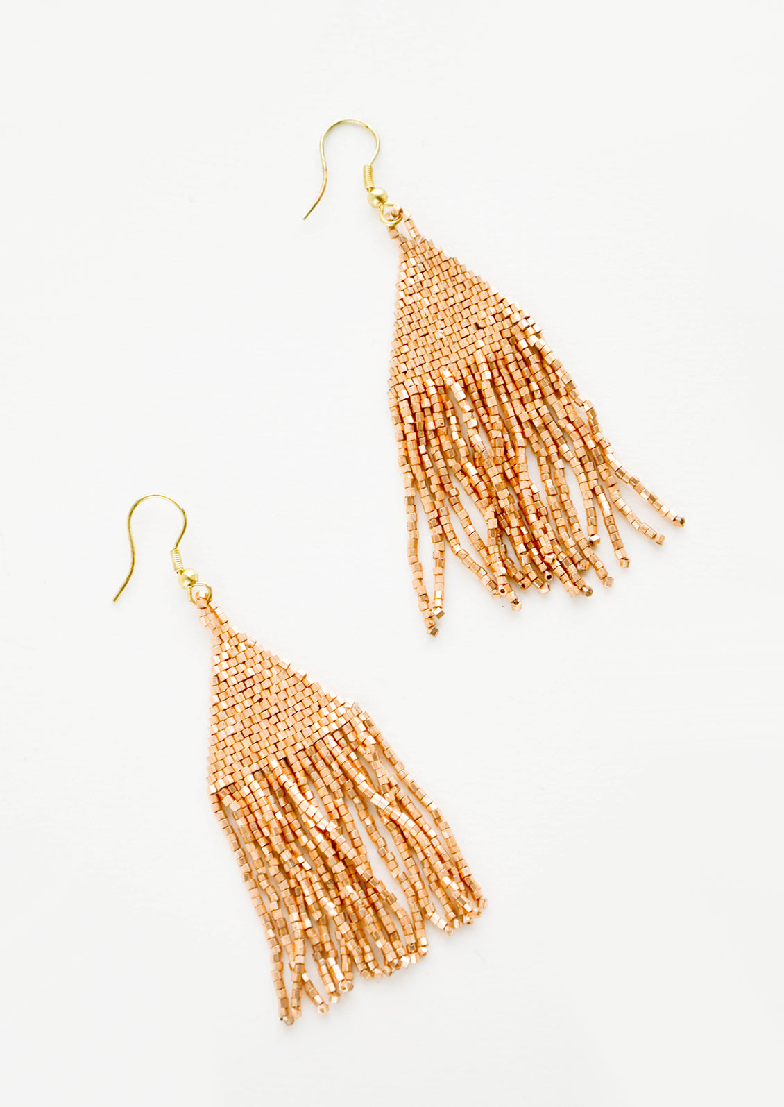 Metallic copper triangular fringe beaded earrings.