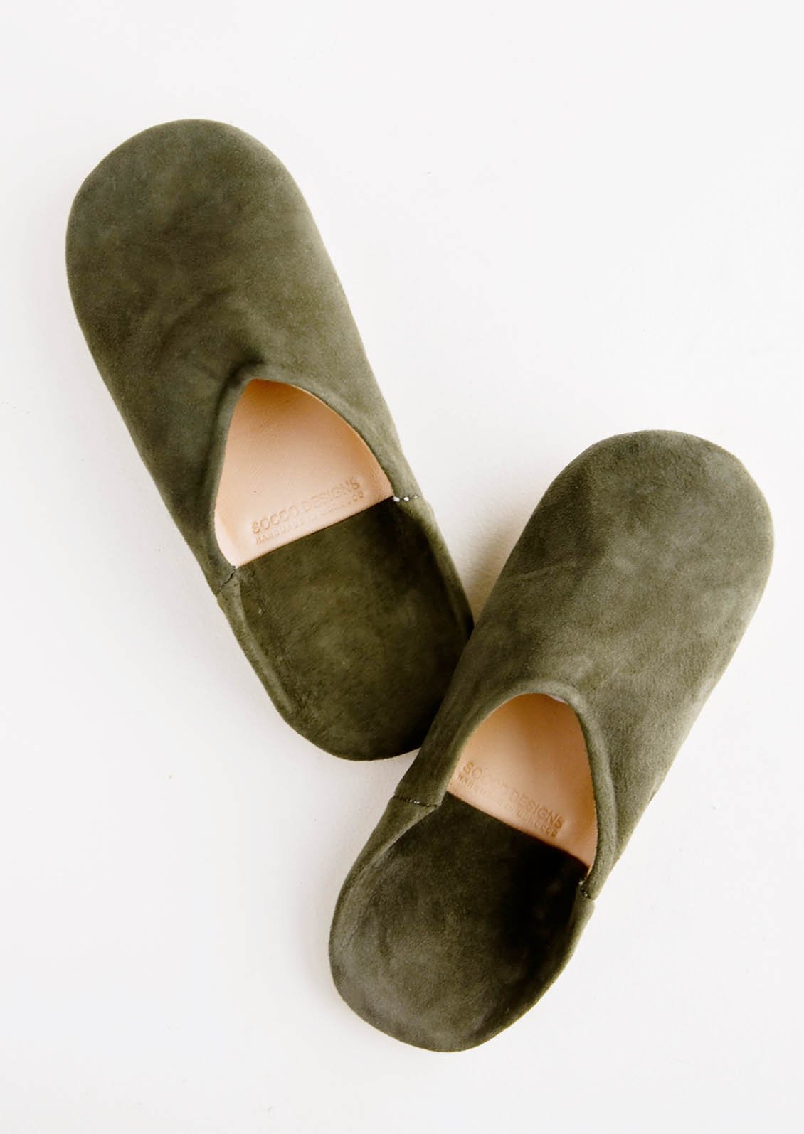 Pair of suede house slippers in olive green